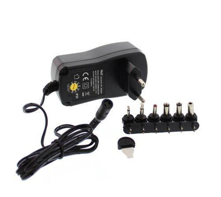Alimentator universal in comutatie 2250mA 3-12V 2.25A 6 mufe Well
